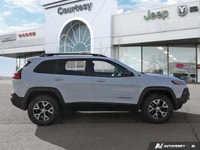 Discover seamless navigation and breathtaking open-air experiences in this Bright White 2017 Jeep Ch... (image 6)