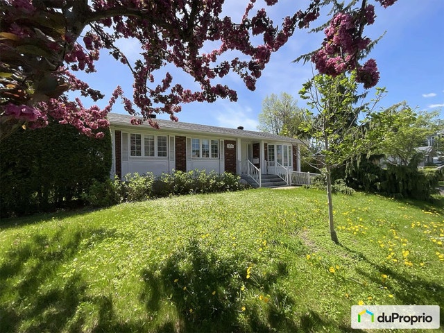 $635,000 - Bungalow for sale in Ste-Rose — photo 1