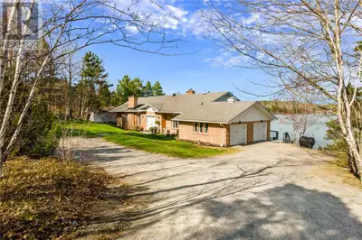 Welcome to this stunning executive residence tucked away on a private 1.18-acre lot in the prestigio...