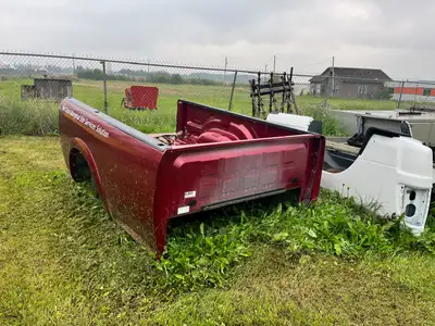 8FT BOXES 2012 RAM 2500 WHITE BOX HAS MINOR DENT BELOW TAILLIGHT. BURGUNDY BOX HAS SMALL SCRATCHES $...