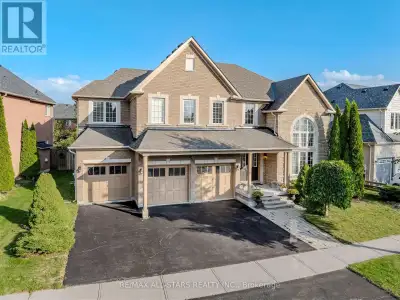 This is the one! An impressive 3,686 sq ft executive home, a brick and stone masterpiece nestled on...