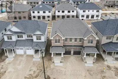 TRIBUTE COMMUNITY STORYBOOK SEMI DETACHED WITH 4 BEDROOMS AND 3 WASHROOMS. ALL BRICK EXTERIOR. ONE O...