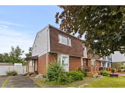 Spacious corner-unit townhouse offering more living space than neighboring units thanks to an expand...