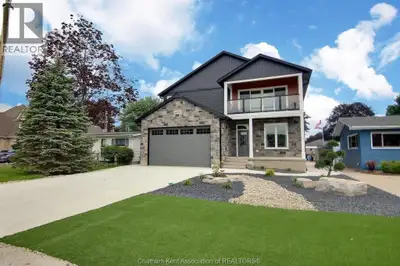 Custom built home on a deep blue water canal in the sought after Riverside Drive just south of Port...