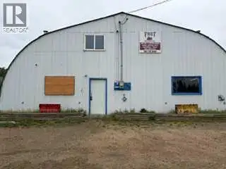 This shop has a huge parking area, suitable for storage or a mechanical shop. (id:24493) MLS® #A2318...