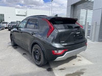 AMVIC Licensed Dealer The 2025 Kia Niro EX FWD, finished in Interstellar Grey, is a smart and effici... (image 5)