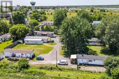 Wow, real estate at 14 times gross income, with very low expenses! Rental of 7 mobile home lots: $27...