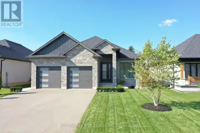 Welcome home! Step into the heart of modern elegance as you explore this stunning bungalow built by...
