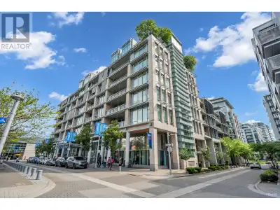 Located in the heart of Olympic Village, this 1175 SF corner unit offers 2 spacious beds + den with...