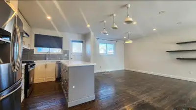 BASEMENT NOT INCLUDED Property: Bright & Spacious Newly Renovated Main Floor Of A Detached Home In Q...