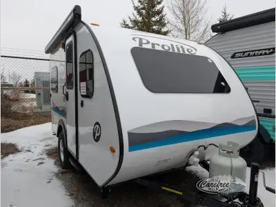 Prolite travel trailer Mini highlights: Sleeps Four Sofa Bed Storage Door Exterior Shower Hitch up y...