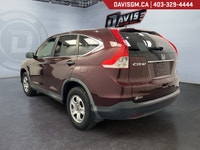 The 2013 Honda CR-V LX 4WD delivers a smart combination of everyday practicality, confident all-weat... (image 6)