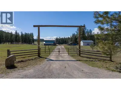 Welcome to country living at its finest! Set on a flat, fully fenced 6.99-acre lot, this property is...