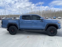 AMVIC Licensed Dealer The 2018 Toyota Tacoma TRD Off Road 4x4 Double Cab, finished in Blazing Blue M... (image 9)