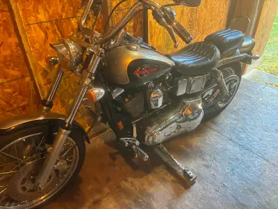 1997 Dyna Wide Glide. It's in miles not KMS (12283). Bike is like new. Come with many extras, Heated...