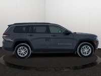 This 2025 JEEP GRAND CHEROKEE L LAREDO 4X4 has the following options Cloth Seats, Power Sunroof, Rem... (image 5)