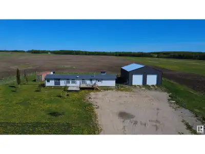 Incredible property offering nearly 70 acres of productive, workable land. The updated modular home...