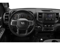 The 2021 Ram 3500 Tradesman, proudly presented in a pristine White finish, is a powerhouse of capabi... (image 3)