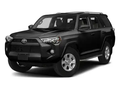 Midnight settles over the pavement, and the 2017 Toyota 4Runner SR5 in Midnight Black Metallic answe...