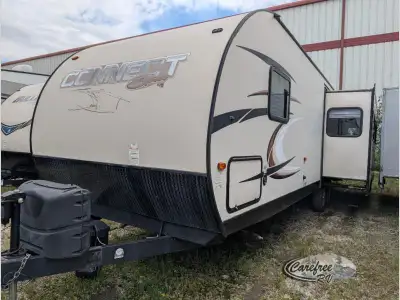 The C310RKS Spree Connect travel trailer by KZ features a rear kitchen and a single slide.As you ent...
