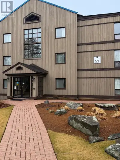 Experience resort-style living on Peninsula Lake in this furnished third-floor Summit Lodge condo at...