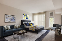 Amenities: Air Conditioning • Spacious Rooms • Heat & Water Included Suite & Building: Bachelor, one... (image 1)