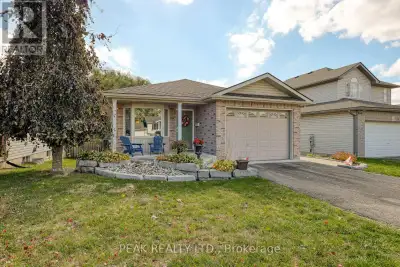 Welcome Home! This charming brick bungalow is perfect for those ready to enjoy bright, comfortable m...