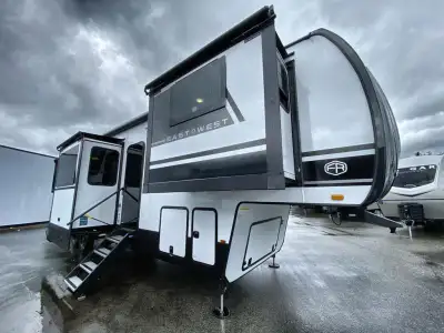 EAST TO WEST Ahara fifth wheel 380FL highlights: Rear Master Bath Kitchen Island with Extensions 24i...