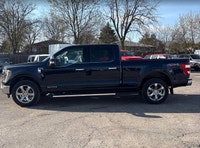 Command the road and conquer your workday with this striking black 2022 Ford F-150 LARIAT, featuring... (image 1)