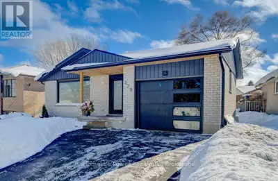 Move-in ready and completely updated from top to bottom! This stunning bungalow features a fully fin...