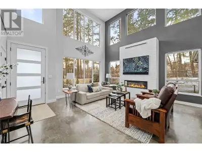 Custom Creekfront Home | Legal Suite | Modern Luxury in a Park-Like Setting **** Why settle for a po...