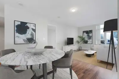 Built beside City Hall on a quiet cul-de-sac in Central Lonsdale, Bridgewater offers a rooftop terra...