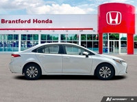 Drive further and smarter with this exceptional 2025 Toyota Corolla Hybrid LE, now available with ju... (image 7)