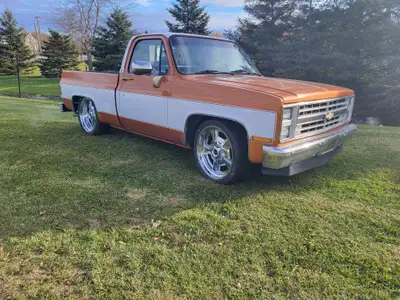 Check out this Lowered 1986 Chevy C10 Squarebody! 350 V8, automatic transmission. Cosmetic touch ups...