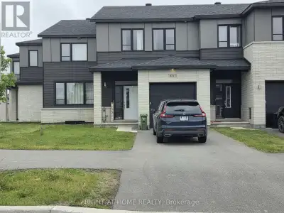 Modern, Luxurious, Newer Townhome boasting of over 2,100 sqft. Main Floor has inviting foyer, Huge L...