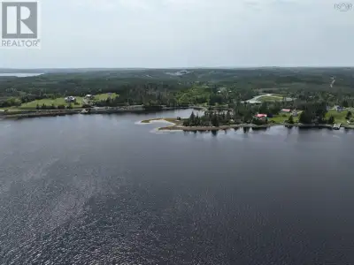 Waterfront acreages! 7.31 acres of raw land to be sculpted into your personal oasis. Warm bay waters...