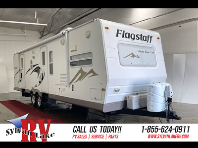 The 2010 Forest River Flagstaff 831FKSS is a well-appointed travel trailer from the Classic Super Li...