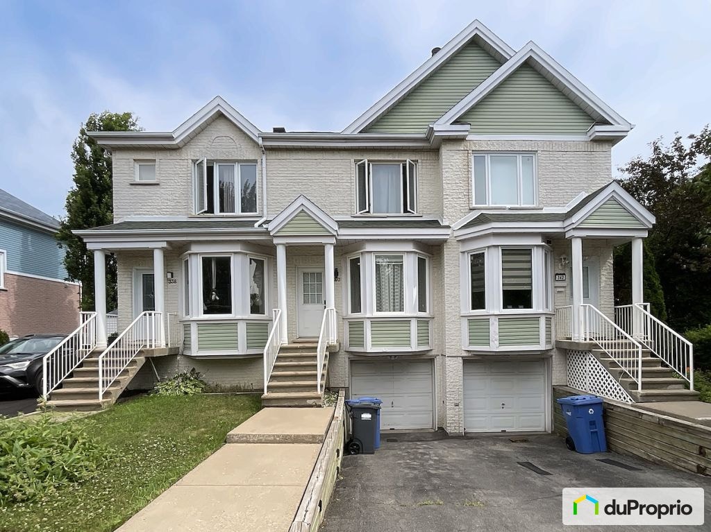 $518,000 - Townhouse for sale in Longueuil (Vieux-Longueuil) — photo 1