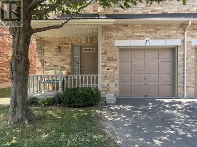 Experience the best of townhome living in this exquisite end unit, designed to feel like a semi-deta...