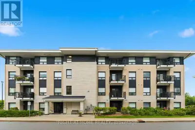 Welcome to this beautifully finished top-floor corner suite offering just under 1,300 sq. ft. of spa...