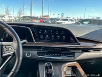 The 2021 Cadillac Escalade includes a panoramic sunroof, power-retractable running boards, hands-fre... (image 9)