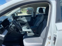 Experience confident city driving and weekend adventures in the 2024 Volkswagen Taos Trendline, a tu... (image 7)