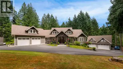 Escape to this private 3-acre West Coast estate offering 5,300 sq ft of finished living space in a p...