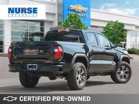 Unleash the power and capability of this 2023 GMC Canyon AT4 Crew Cab. This robust truck boasts a po... (image 4)