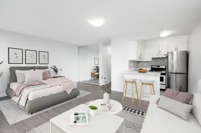 Positioned just off the bustling Cambie Street in the South Granville/Mouth Pleasant district, Holly...