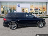 This Volkswagen Tiguan delivers a Intercooled Turbo Regular Unleaded I-4 2.0 L/121 engine powering t... (image 5)