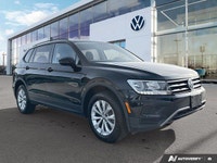 This Volkswagen Tiguan delivers a Intercooled Turbo Regular Unleaded I-4 2.0 L/121 engine powering t... (image 6)