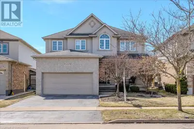 Welcome to your dream home, perfectly situated on a private lot overlooking serene fields in the pre...