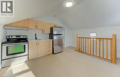 This well-situated 1.5-storey duplex features two self-contained one-bedroom units, each with a priv...