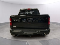 The 2026 Ram 1500 Big Horn 4x4 Crew Cab 57 Box comes in a striking Diamond Black Crystal Pearl finis... (image 3)